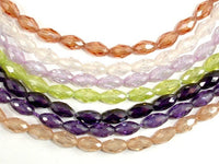 CZ bead, 4 x 7 mm Faceted Rice-RainbowBeads